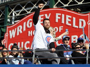 Ben Zobrist of the Chicago Cubs waves to the crowd during a World Series victory parade on Nov. 4, 2016 in Chicago, Ill. (Dylan Buell/Getty Images)