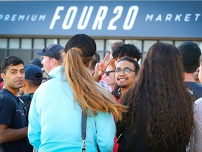 People lined up at FOUR20 Premium Market on MacLeod Trail in Calgary on Oct. 19, 2018.