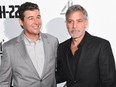 Kyle Chandler and George Clooney attend the "Catch 22" U.K. premiere on May 15, 2019 in London, England.