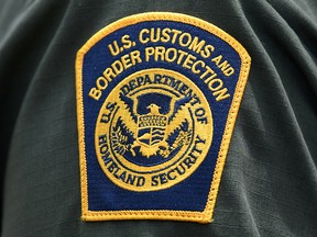 A U.S. Customs and Border Protection patch is seen on the arm of a U.S. Border Patrol agent in Mission, Texas, U.S., July 1, 2019. (REUTERS/Loren Elliott/File Photo)
