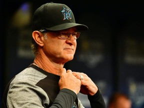 Marlins manager Don Mattingly looks on during the fifth inning of a game against the Rays at Tropicana Field in St. Petersburg, Fla., on Aug. 4, 2019.