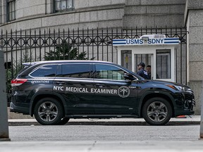 A medical examiner vehicle is seen at Metropolitan Correctional Center where financier Jeffrey Epstein was found dead in New York August 10, 2019. (REUTERS/Jeenah Moon/File Photo)