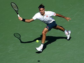 Roger Federer of Switzerland returns a shot to Andrey Rublev of Russia during Day 6 of the Western and Southern Open at Lindner Family Tennis Center on Aug. 15, 2019 in Mason, Ohio.