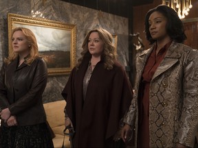 From left, Elizabeth Moss, Melissa McCarthy and Tiffany Haddish star in "The Kitchen." (Alison Cohen Rosa/Warner Bros. Pictures)