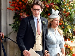 Caspar Jopling and Ellie Goulding after the wedding of Princess Eugenie to Jack Brooksbank at St George's Chapel in Windsor Castle on October 12, 2018 in Windsor, England. (Matthew Crossick - WPA Pool/Getty Images)