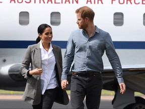 Eco-warrior Prince Harry and his wife Meghan, the Duchess of Sussex have been criticized for taking four private jet planes over the past 11 days. 
DEAN LEWINS/AFP/Getty Images