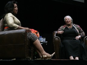 Talk show host Oprah Winfrey, left, talks with Nobel and Pulitzer Prize-winning author Toni Morrison during the annual Carl Sandburg Literary Awards Dinner October 20, 2010, in Chicago, Ill. (Frank Polich/Getty Images)