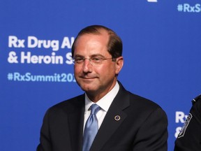 Alex Azar, Secretary of Health and Human Services, listens to President Donald Trump speak at the Rx Drug Abuse & Heroin Summit on April 24, 2019 in Atlanta, Georgia.