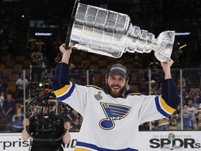 Joel Edmundson of the St. Louis Blues holds the Stanley Cup following the Blues victory over the Boston Bruins at TD Garden on June 12, 2019 in Boston. (Bruce Bennett/Getty Images)