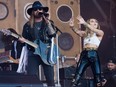 Billy Ray Cyrus and Miley Cyrus perform on the Pyramid stage on day five of Glastonbury Festival at Worthy Farm, Pilton on June 30, 2019 in Glastonbury, England.