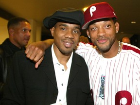 Actors Duane Martin and Will Smith pose for photos at the premiere of "Deliver Us From Eva" at the Cinerama Dome and after-party at the Sunset Room on Jan. 29, 2003 in Hollywood, Calif. (Kevin Winter/Getty Images)