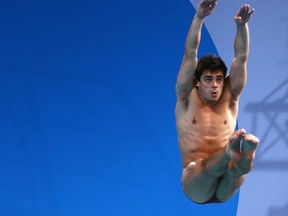 Chris Mears of England competes in the Men's Synchronized three-metre Springboard Final at Royal Commonwealth Pool during day nine of the Glasgow 2014 Commonwealth Games on August 1, 2014 in Edinburgh. (Quinn Rooney/Getty Images
