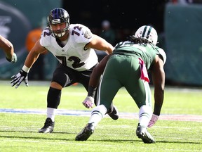 Alex Lewis #72 of the Baltimore Ravens plays against  Lorenzo Mauldin #55 of the New York Jets during their game at MetLife Stadium on October 23, 2016 in East Rutherford, New Jersey.