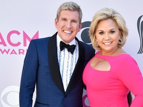 TV personalities Todd Chrisley and Julie Chrisley attend the 52nd Academy Of Country Music Awards at Toshiba Plaza on April 2, 2017 in Las Vegas.  (Frazer Harrison/Getty Images)