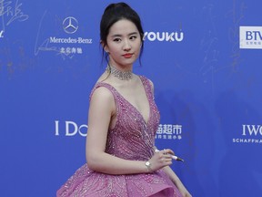 Actress Liu Yifei arrives at the red carpet of the 7th Beijing International Film Festival on April 16, 2017 in Beijing, China.