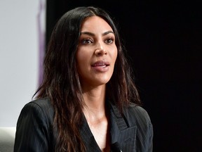 Kim Kardashian says she's stopping at four kids with things "too busy" right now. (Photo by Dia Dipasupil/Getty Images)