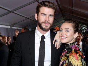 Liam Hemsworth and Miley Cyrus at The World Premiere of Marvel Studios' "Thor: Ragnarok" at the El Capitan Theatre on Oct. 10, 2017 in Hollywood, Calif.  (Rich Polk/Getty Images for Disney)