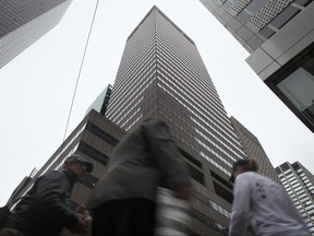 People walk by The Piaget Building at 650 5th Avenue, which has been named as being owned by the Iranian government, on November 13, 2009 in New York City.