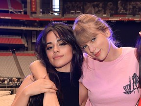 (L-R) Camila Cabello, Taylor Swift, and Charli XCX pose onstage before opening night of Taylor Swift's 2018 Reputation Stadium Tour at University of Phoenix Stadium on May 8, 2018 in Glendale, Arizona. Christopher Polk/Getty Images for TAS