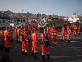 Members of the Spanish Army Emergency Military Unit prepare to travel by boat from Tenerife to the island of Gran Canaria to participate in the extinction of a new forest fire in the town of Valleseco on August 17, 2019. (DESIREE MARTIN/AFP/Getty Images)