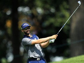 Adam Hadwin of Canada plays a shot on the 14th hole during the second round of the BMW Championship at Medinah Country Club No. 3 on Aug. 16, 2019 in Medinah, Ill.