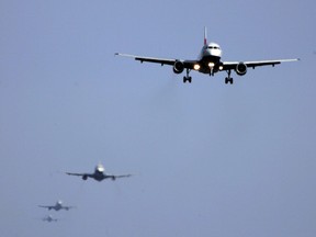 Planes queue to take take their turn to land at Heathrow Airport on March 16, 2007 in London. (Matt Cardy/Getty Images)