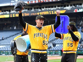 Jameson Taillon is doused with Powerade and bubble gum by Starling Marte and Josh Bell at PNC Park on April 8, 2018 in Pittsburgh. (Joe Sargent/Getty Images)