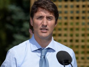 Prime Minister Justin Trudeau speaks about a watchdog's report that he breached ethics rules by trying to influence a corporate legal case regarding SNC-Lavalin, in Niagara-on-the-Lake, Ont., on Aug. 14, 2019.