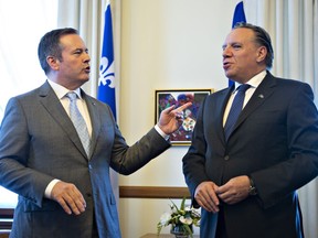 Alberta Premier Jason Kenney, left, chats with Quebec Premier Francois Legault on Wednesday, June 12, 2019 at the Quebec Premier's office in Quebec City. Kenney said Monday his Quebec counterpart does not understand the history of equalization.THE CANADIAN PRESS/Jacques Boissinot
