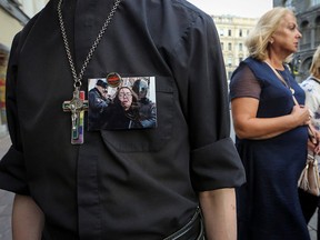 A supporter of LGBT community attends a rally after the murder of Elena Grigoryeva, activist for LGBT rights, in Saint Petersburg, Russia July 23, 2019. (REUTERS/Igor Russak)