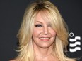 In this handout photo provided by Discovery, Actress Heather Locklear attends TLC "Too Close To Home" Screening at The Paley Center for Media on Aug. 16, 2016, in Beverly Hills, Calif.