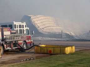 The aftermath of a dairy farm fire is shown northeast of Steinbach, Man. on Monday, Aug.12, 2019 in a handout photo. An early morning fire has destroyed a four-barn dairy complex. THE CANADIAN PRESS/HO-Steinbachonline