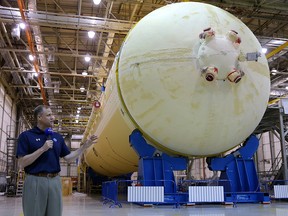 NASA administrator Jim Bridenstine speaks to media during a visit to NASA's Michoud Assembly Facility where engineers are preparing to add the final section to the core stage of the rocket that will power NASA’s Artemis 1 lunar mission, in New Orleans, La., Aug. 15, 2019.