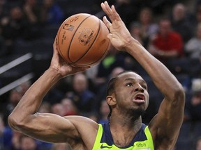 Minnesota Timberwolves Andrew Wiggins (22) shoots as Brooklyn Nets guard Nik Stauskas (2) defends during the third quarter of an NBA basketball game Saturday, Jan. 27, 2018, in Minneapolis. (Andy Clayton-King/AP)