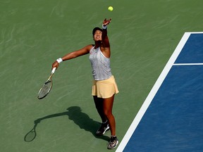 Naomi Osaka of Japan serves to Sofia Kenin during the Western & Southern Open at Lindner Family Tennis Center on Aug. 16, 2019 in Mason, Ohio.