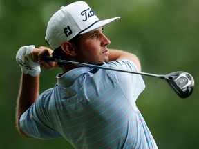 J.T. Poston hits a tee shot on the 15th hole during the final round of the Wyndham Championship at Sedgefield Country Club on Aug. 4, 2019 in Greensboro, N.C.