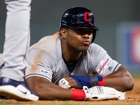 Cleveland Indians outfielder Yasiel Puig blows a kiss to the dugout during a game against the Minnesota Twins at Target Field. (Brad Rempel-USA TODAY Sports)