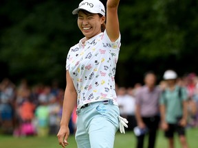 Hinako Shibuno of Japan celebrates her winning putt during the final round of the AIG Women's British Open at Woburn Golf Club on Aug. 4, 2019 in Woburn, England.