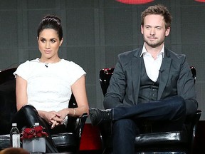 Meghan Markle and Patrick J. Adams of the television show "Suits" speak during the NBC Universal portion of the 2014 Winter Television Critics Association Press Tour at the Langham Hotel on Jan. 18, 2014 in Pasadena, Calif. (Frederick M. Brown/Getty Images)