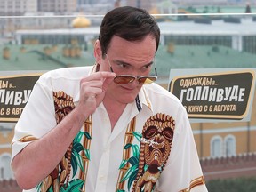 Film director Quentin Tarantino poses for a picture during a photocall for his new movie "Once Upon a Time in Hollywood" ahead of its Russian premiere in central Moscow, Russia Aug. 7, 2019.