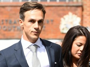 Denmark golfer Thorbjorn Olesen and an unidentified woman leave the Uxbridge magistrates court in Uxbridge, England, on Wednesday, Aug. 21, 2019.