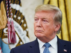 President Donald Trump is seen during the presentation ceremony to Celtics legend Bob Cousy in the Oval Office of the White House in Washington on August 22, 2019. (MANDEL NGAN/AFP/Getty Images)