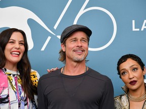 Liv Tyler, Brad Pitt and Ruth Negga attend a photocall on Aug. 29, 2019 for the film "Ad Astra" during the 76th Venice Film Festival at Venice Lido.