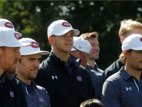 Canadiens forward Jesperi Kotkaniemi (centre) poses for photo with teammates at club’s annual golf tournament on Sept. 9, 2019, at Laval-sur-le-Lac.