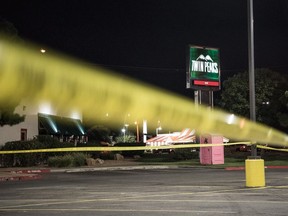 Police tape marks the scene outside a Twin Peaks restaurant after multiple people were shot on August 31, 2019 in Odessa, Texas. Officials say an unidentified suspect was shot and killed after killing 7 people and injuring 21 in Odessa and nearby Midland.