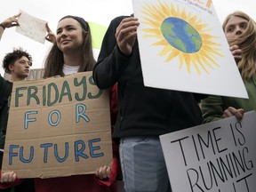 Student environmental advocates participate in a strike to demand action be taken on climate change outside the White House on September 13, 2019 in Washington, DC.