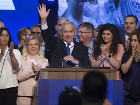Israeli Prime Minister Benjamin Netanyahu, his wife Sara and Likud Party members greet supporters during the Likud Party after vote event on Sept. 18, 2019 in Tel Aviv, Israel. (Amir Levy/Getty Images)
