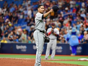 Carlos Carrasco of the Cleveland Indians tips hit hat to manager Terry Francona before the seventh inning during action against the Tampa Bay Rays at Tropicana Field on Sept. 1, 2019 in St. Petersburg, Fla. (Julio Aguilar/Getty Images)