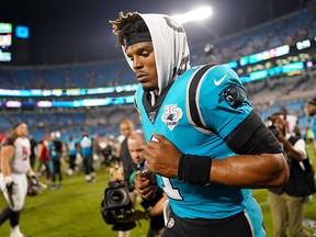 Cam Newton #1 of the Carolina Panthers runs off the field after their game against the Tampa Bay Buccaneers at Bank of America Stadium on September 12, 2019 in Charlotte, North Carolina. (Jacob Kupferman/Getty Images)
