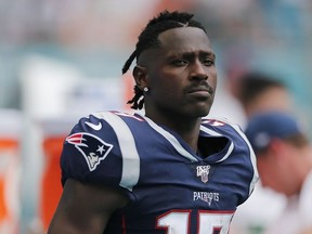 Antonio Brown of the New England Patriots looks on against the Miami Dolphins during the fourth quarter at Hard Rock Stadium on September 15, 2019 in Miami, Florida.